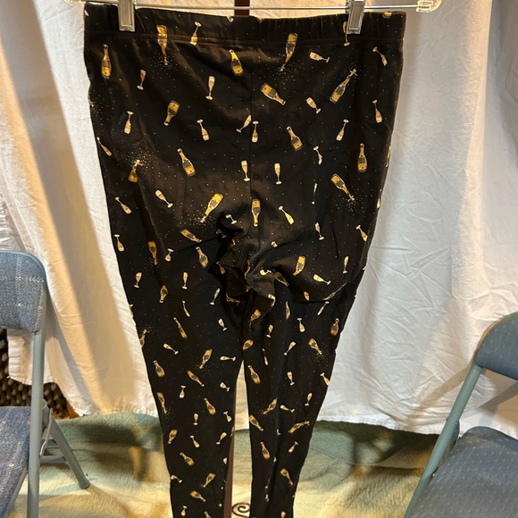 Torrid Black Leggings with Gold Champagne Print - Picture 2 of 5
